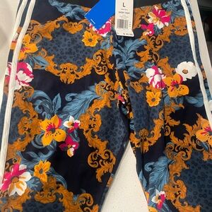 Adidas Floral Patterned Biker Shorts with Blue and Orange Accents